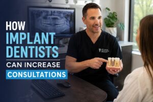 Dentist explaining dental implants during a patient consultation to increase dental implant consultations and treatment acceptance.